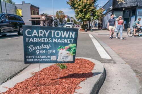 The Carytown Farmers Market is a vibrant Sunday market where locals gather to enjoy fresh produce, artisanal goods, and live music